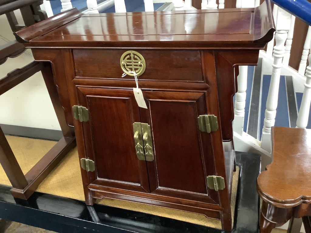 A 20th century Chinese hardwood low cabinet, with brass fitted drawer and cupboard, width 73cm depth 35cm height 72cm